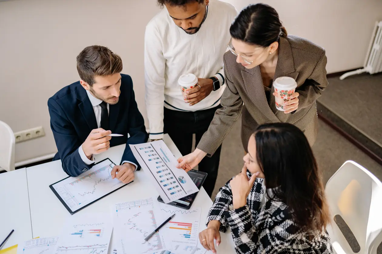 Businesspeople discussing data and strategy