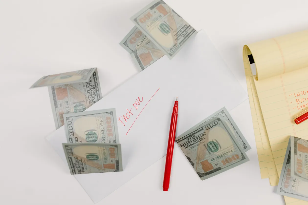 Stacks of dollar bills used for paying bills